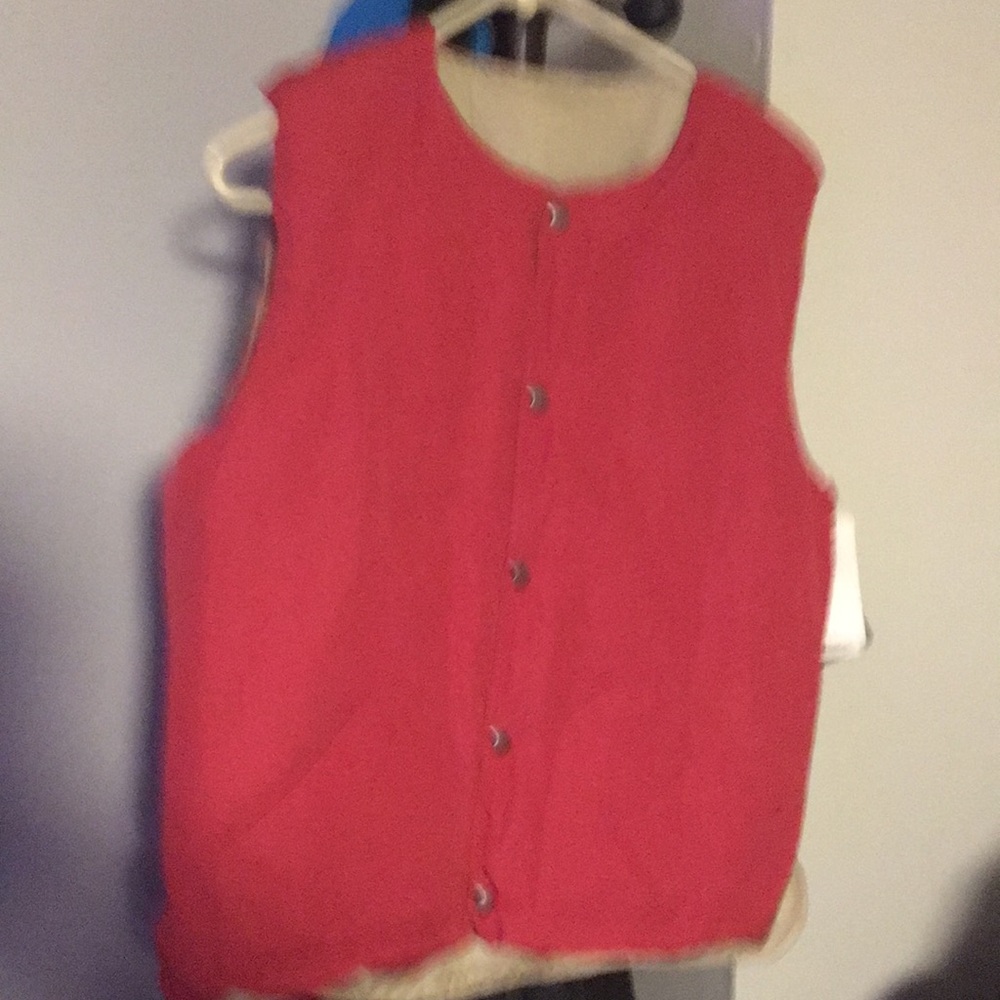 A Pink Sierra  Designs Vest,Parka, Jacket.